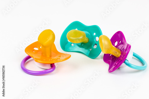 Three Cute Baby pacifiers