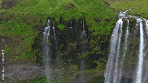 A close-up of a waterfall system on a rock in Iceland. Andreev. photo