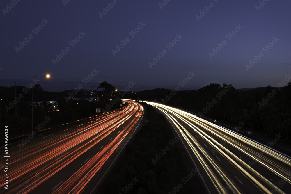 motorway highway road car light trails at night time australia