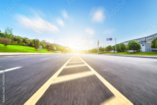 Asphalt road and modern city