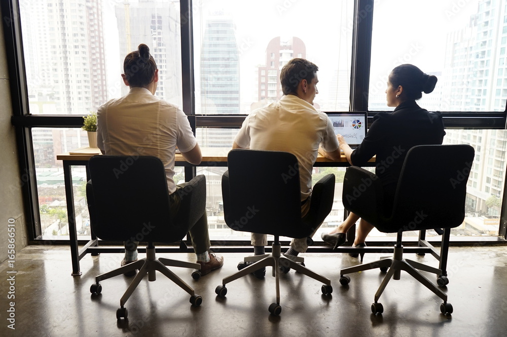 behind of business team working in the office and window view behind of business team working in the office and window view