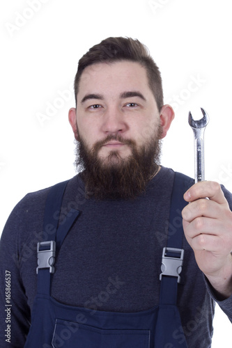 Young man with a wrench