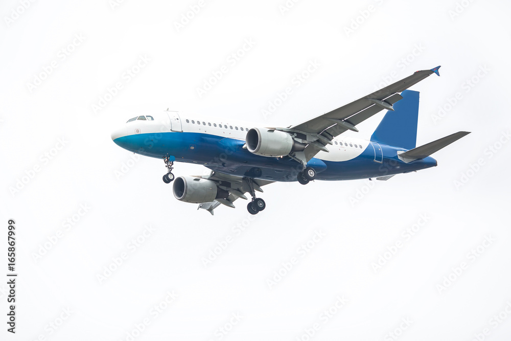 Obraz premium Place flying in sunset sky