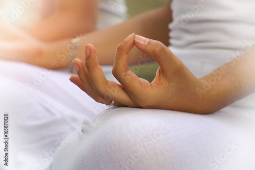 Woman is posing hand for meditation 