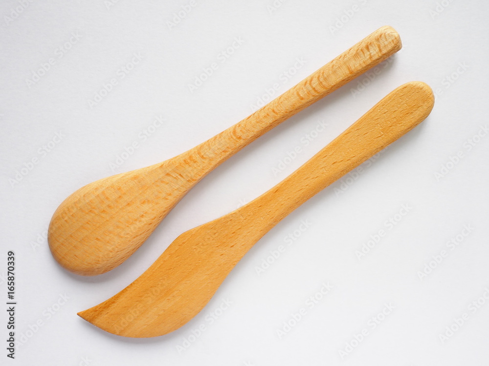 set of beech wood tea spoon and knife on white background set of beech wood tea spoon and knife on white background