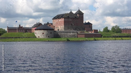 Panorama of lake Vanajavesi with the fortress, june day. Hameenlinna, Finland photo