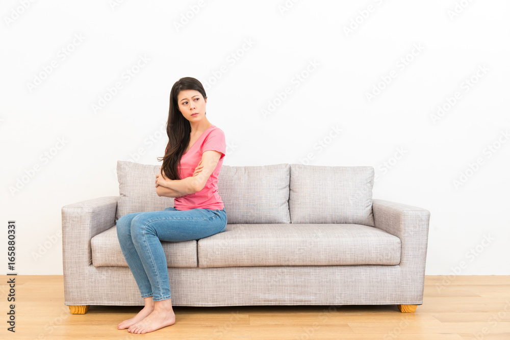 woman performance angry emotion sitting on couch woman performance angry emotion sitting on couch
