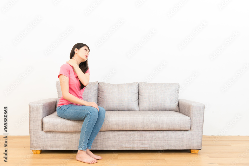 woman sitting long time feeling shoulder pain woman sitting long time feeling shoulder pain