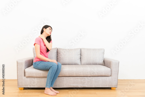 woman sitting long time feeling shoulder pain © PR Image Factory