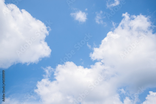 Fantastic soft white clouds against blue sky background