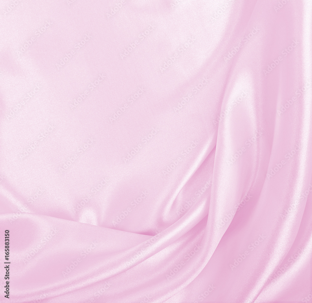 Obraz premium Smooth elegant pink silk or satin texture as wedding background. Luxurious background design