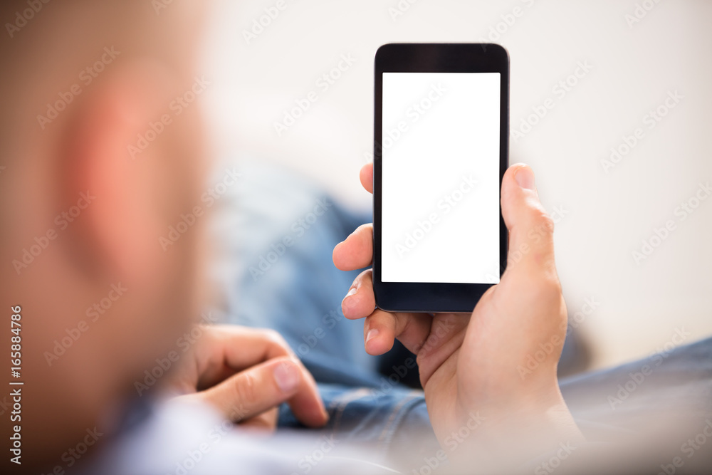 Close-up Of A Hand Holding Cell Phone Close-up Of A Hand Holding Cell Phone