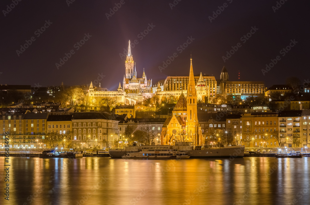Budapest by night from danube river, Hungary