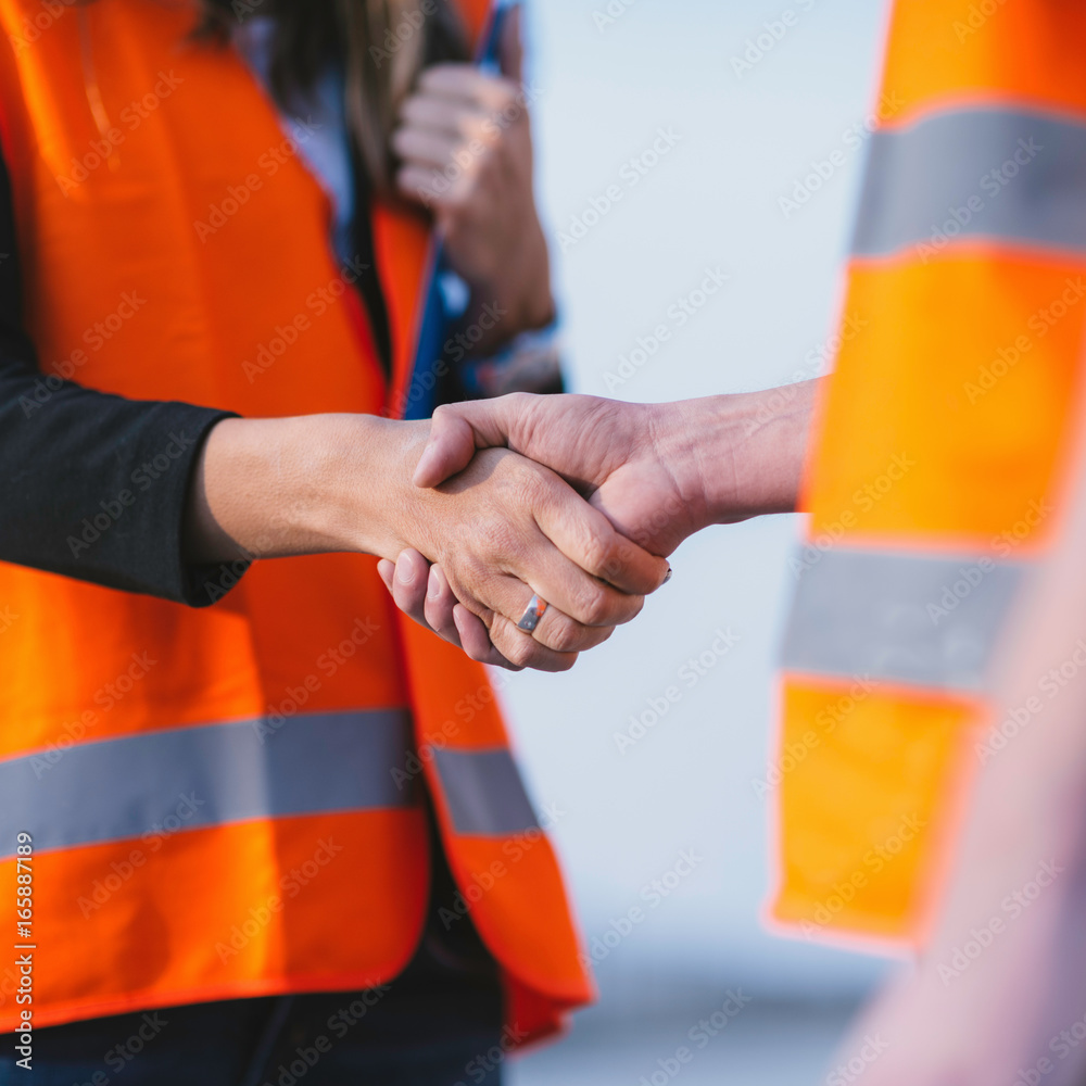 Engineers handshaking Engineers handshaking