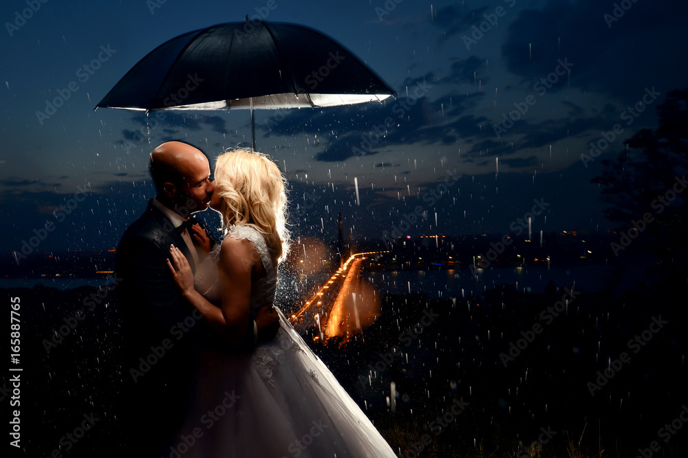 Two lovers under an umbrella main image 1