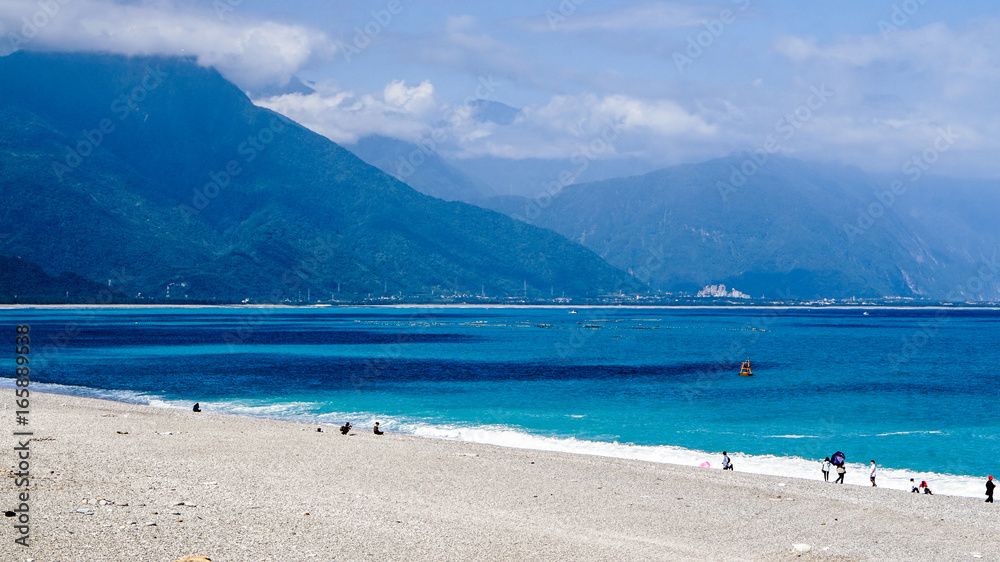 Hualien ocean of Taiwan. China. Beautiful blue sea and granite pebble beach Hualien ocean of Taiwan. China. Beautiful blue sea and granite pebble beach