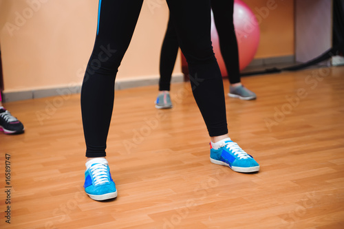 muscle female legs on fitness training