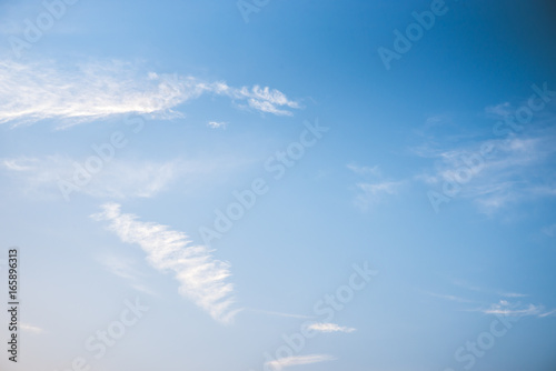 Fantastic soft white clouds against blue sky background © last19