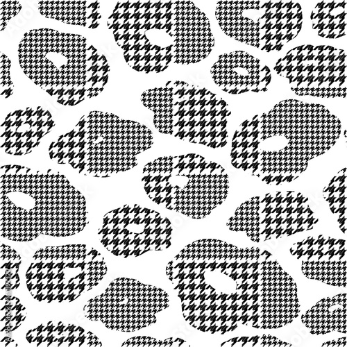 Abstract flowers with hounds-tooth plaid pattern.