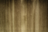 Burnt wooden board surface. Textured background. Vertical grain.