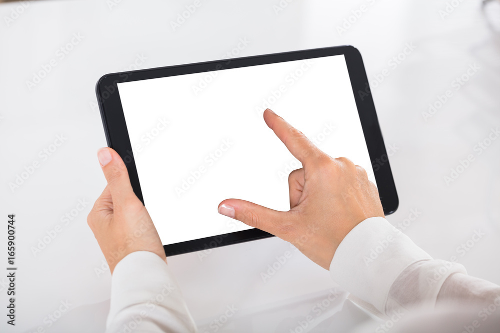 Human Hand Holding Digital Tablet