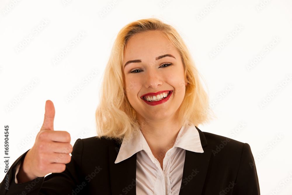 Attractive blonde woman shows thumb up as a gesture for success isolated over white background Attractive blonde woman shows thumb up as a gesture for success isolated over white background
