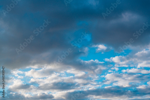 Open blue sky in the clouds, before the storm © markhipov