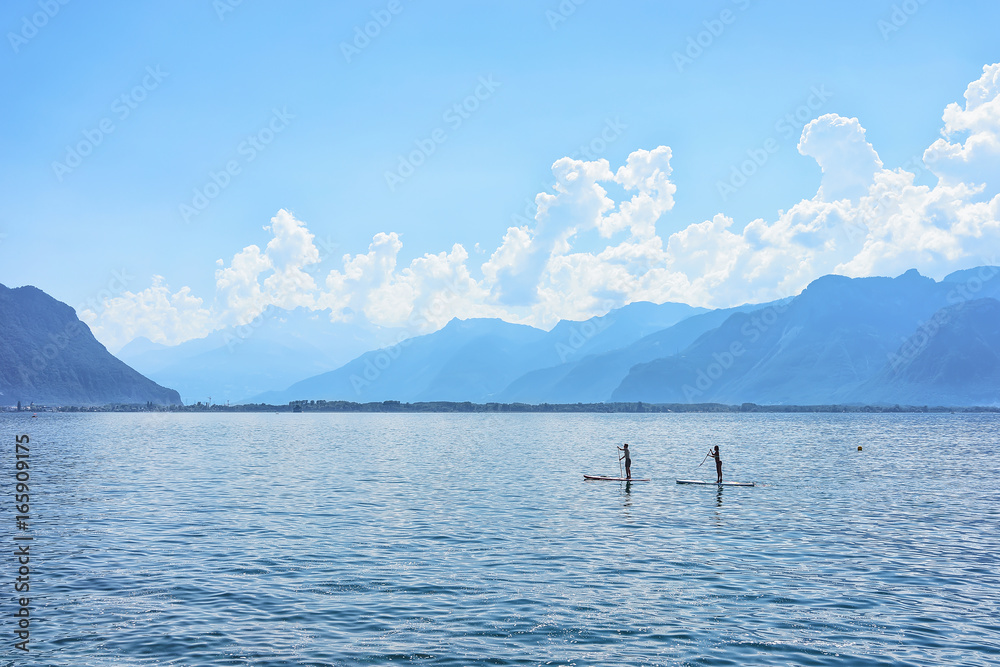 People with Standup paddle board Geneva Lake Swiss Riviera
