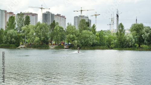 Man is wakeboarding on the lake