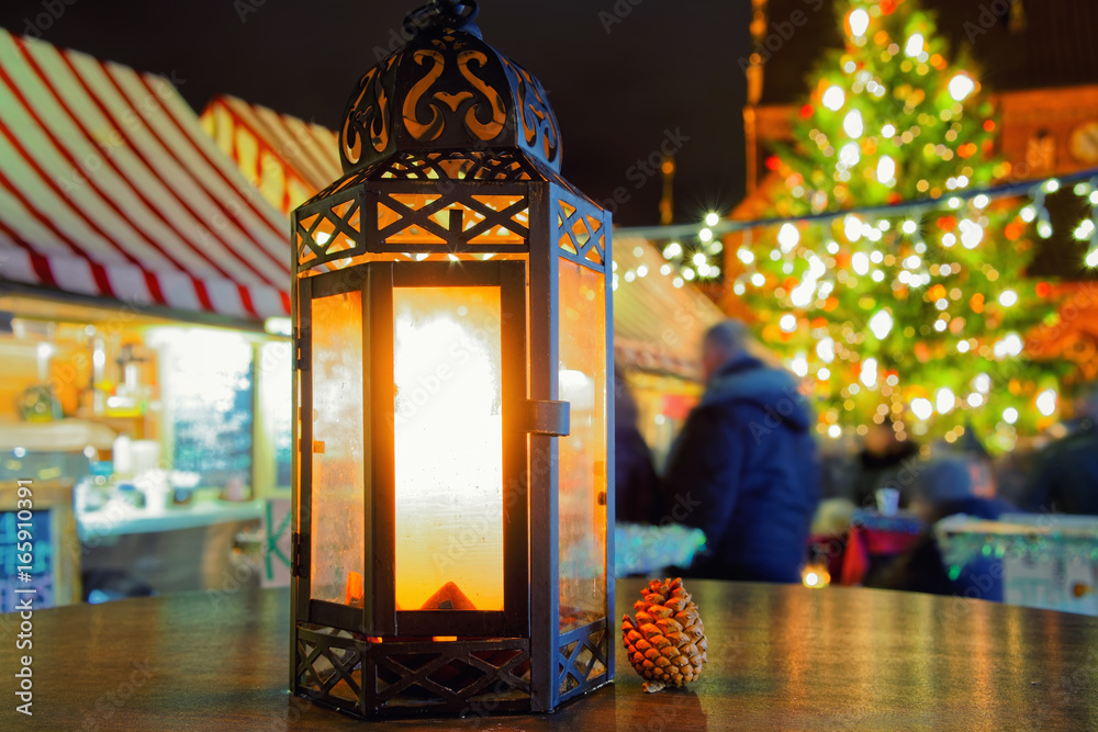 Street lamp in Christmas market in night Riga