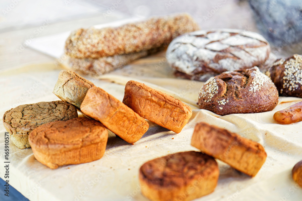 Selection of baked bread on counter Selection of baked bread on counter