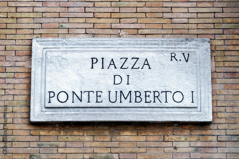 Piazza di Ponte Umberto street sign on wall in Rome Piazza di Ponte Umberto street sign on wall in Rome