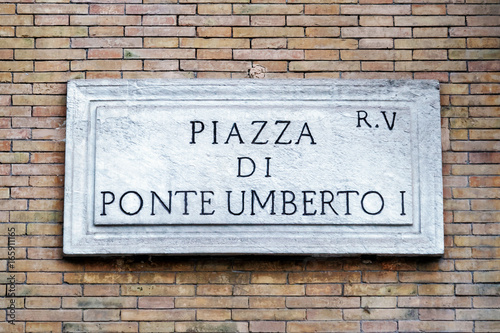 Piazza di Ponte Umberto street sign on wall in Rome