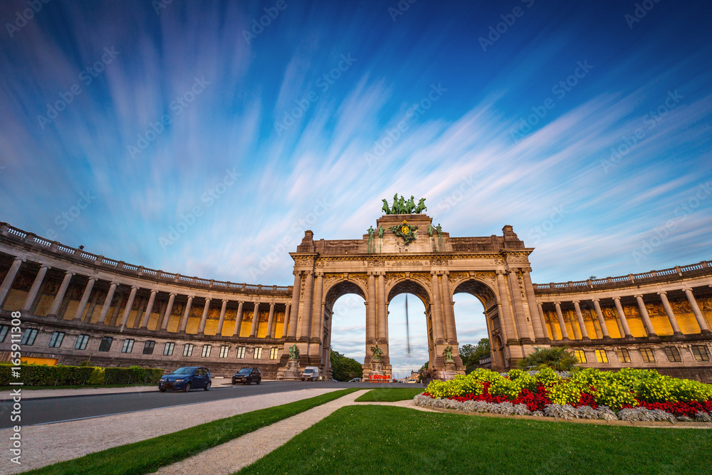Dramatic view of the Triumphal Arch in Park Cinquantenaire in Brussels during sunset
