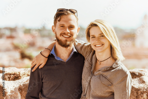 Fotografie Happy young brother and sister hugging