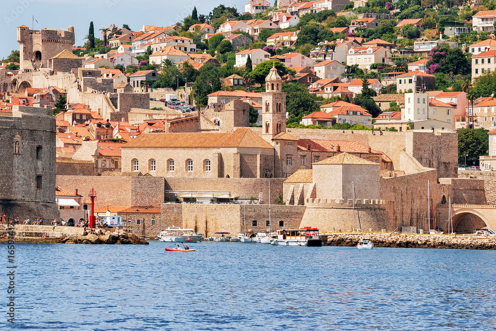 Dubrovnik fort and motorboat at Old port