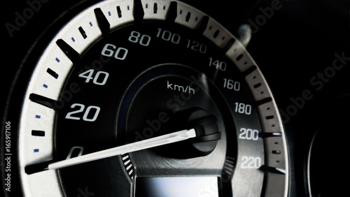 Close up shot of a speed meter in a car