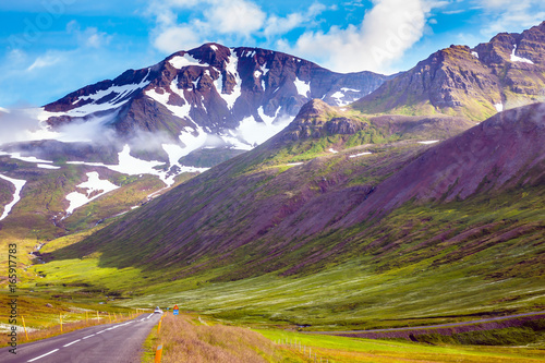 Road among snowy mountains rhyolite photo