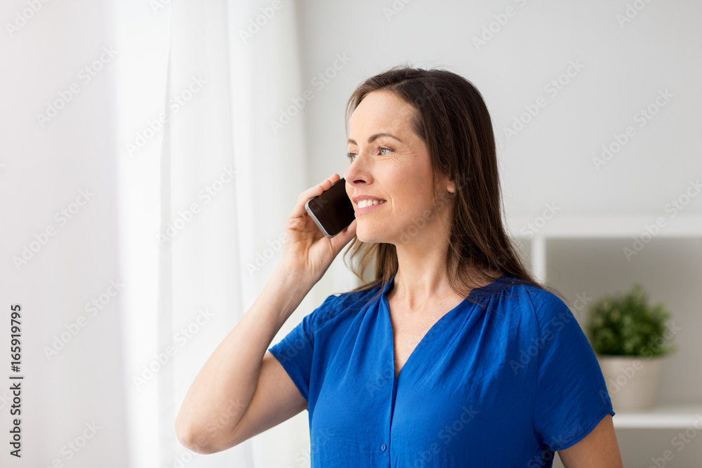 woman calling on smartphone at office or home woman calling on smartphone at office or home