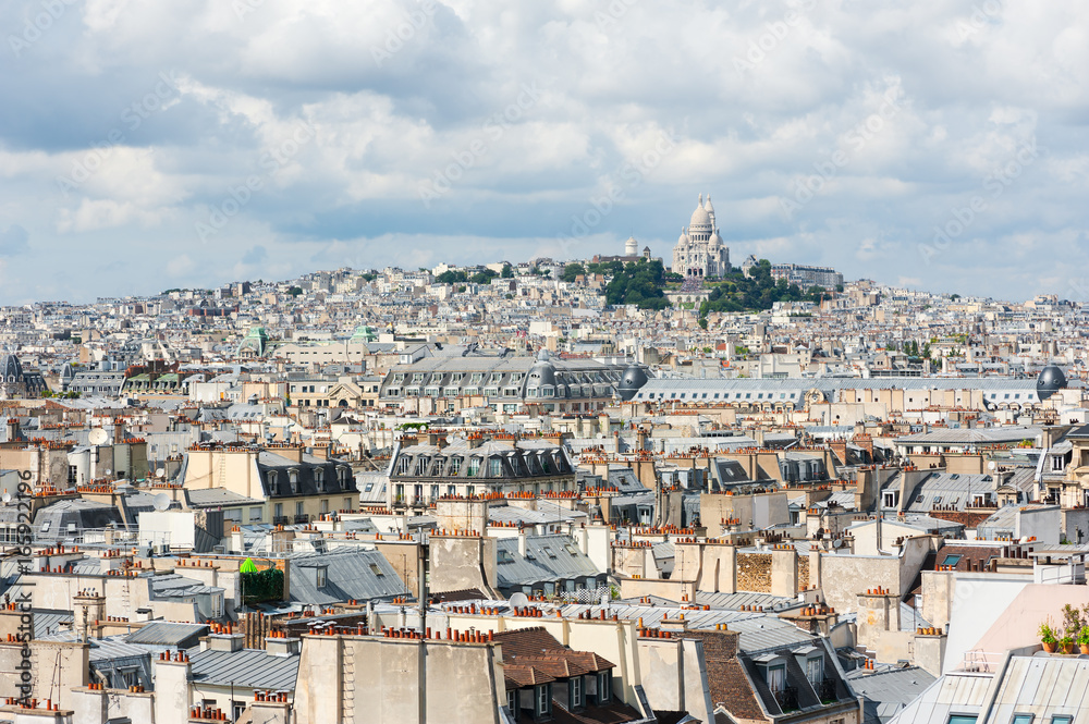 Montmartre - Sacre coeur and paris roof aerial view