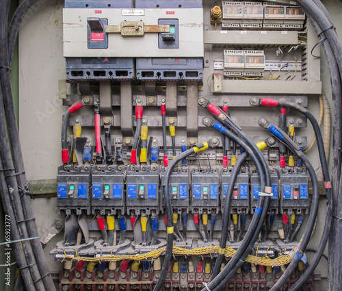 Circuit breaker and copper busbar have a lot of dust which wiring in power supply distribution panel