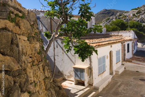 Elevated view of an old house in Cala San Vincente on the Spanish island Mallorca