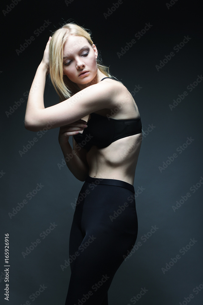 attractive blond girl in dark attractive blond girl in dark