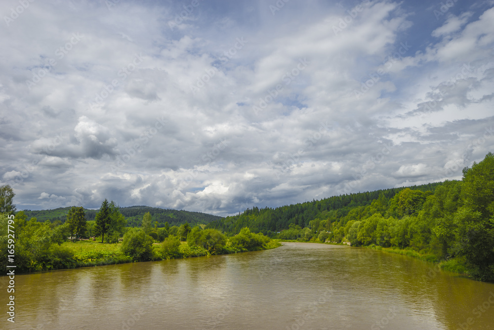 summer day landscape river, mountains, cloudy sky