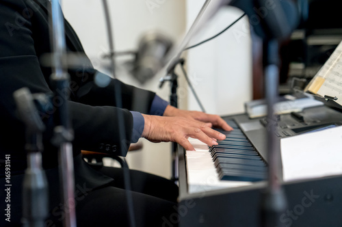 Pianist playing electric piano