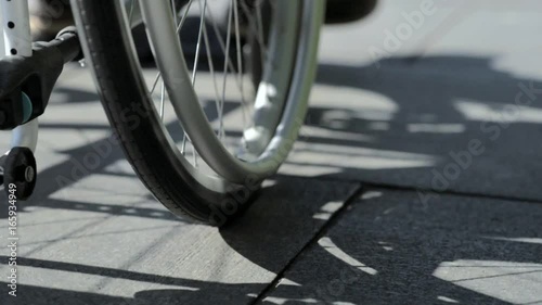 Low angle view of a differently abled man using wheelchair
