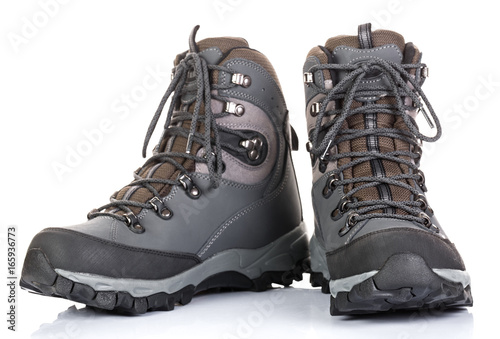 Tourist boots for mountain hikes with reinforced soles and membrane material.