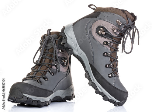 Tourist boots for mountain hikes with reinforced soles and membrane material.
