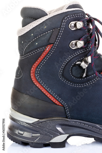 Tourist boots for mountain hikes with reinforced soles and membrane material.