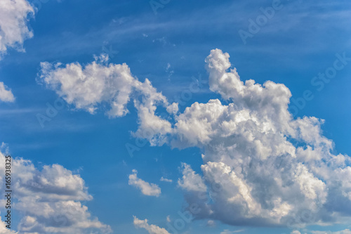 background of a blue sky with a white clouds